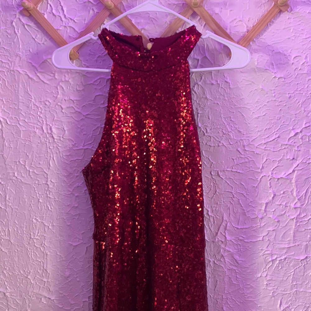 Woman’s prom/homecoming dress. Size: Medium Color: Red.